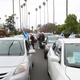 Illustration for article titled Uber and Lyft Drivers Strike Alongside Fast Food Workers in LA, Demand $30 Minimum Wage